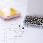 dark gold map pins to mark places visited