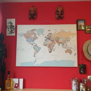 push-pin-world-map-customer-photo-colorful-on-red-wall